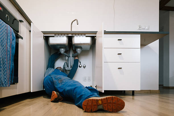 Professional Drain Cleaning technician working in Hallandale, FL